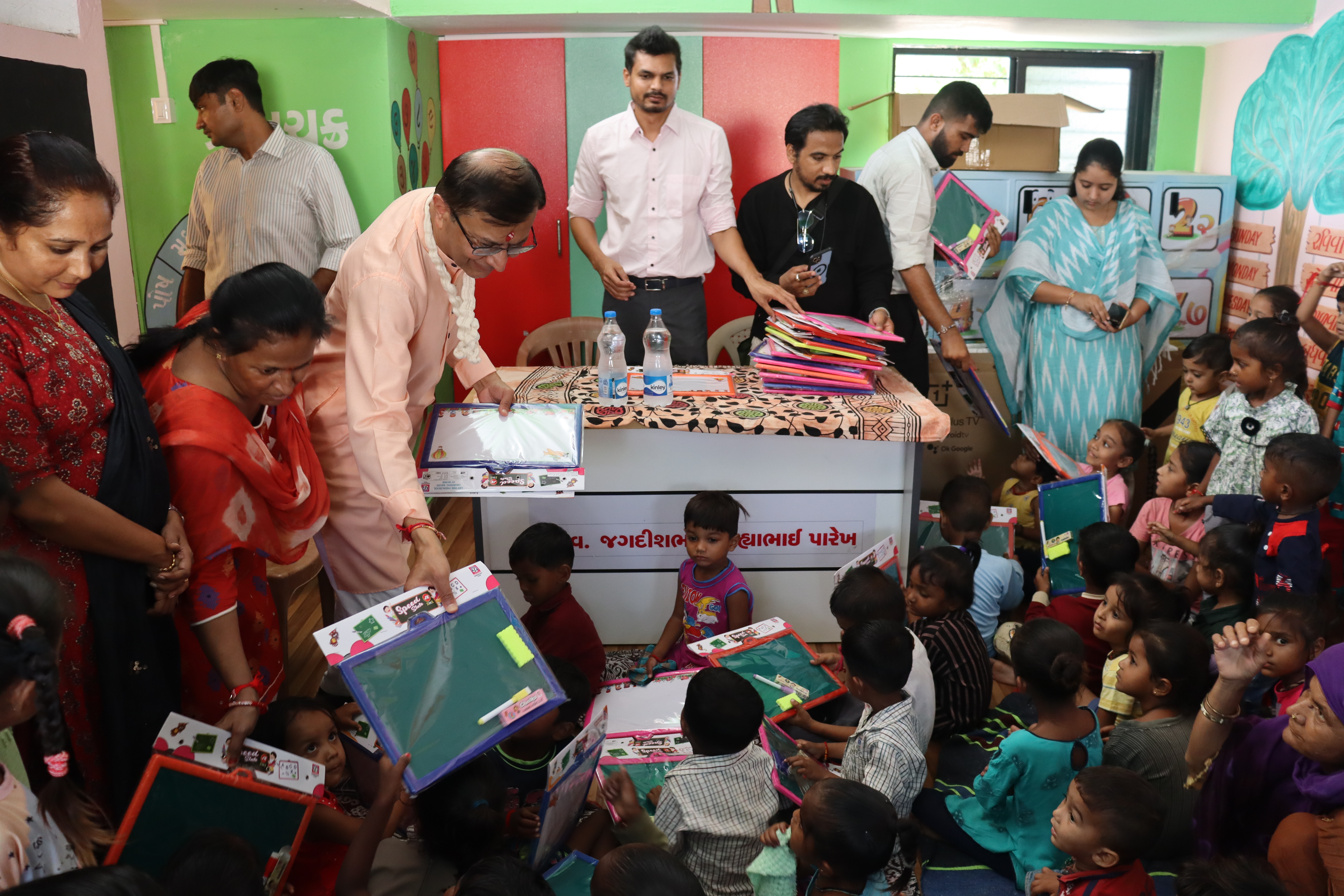 Distribution of study material by Pradeep Uncle